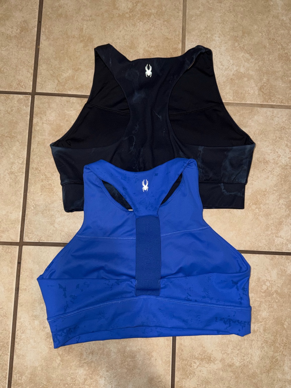 2 Spyder tops size XL